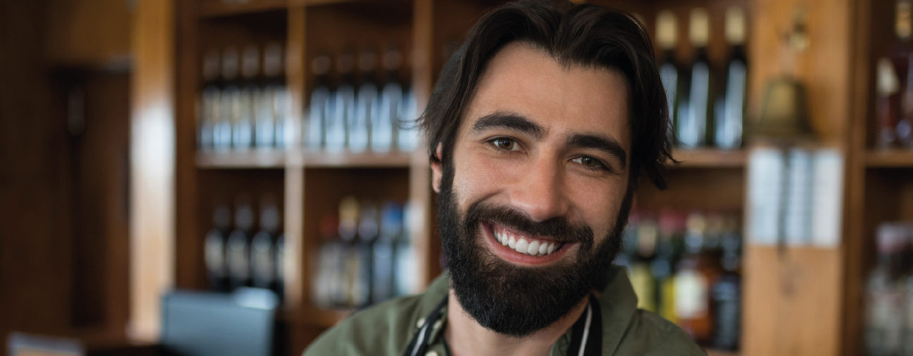 smiling man with beard